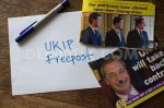 Ripped up UKIP leaflet with Freepost envelope ready to return.