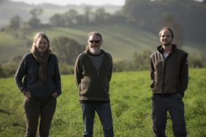 Farmers, Marina O'Connell, Bob Mehew and Dave Wright on the land at Huxhams Cross Farm